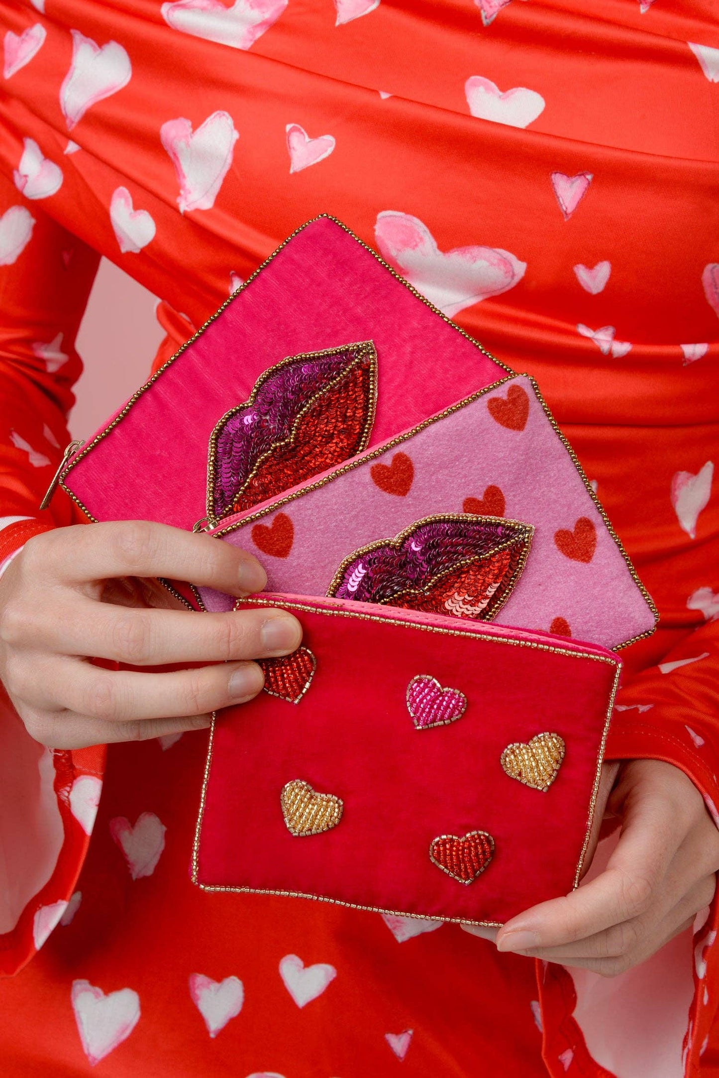 My Doris pink velvet beaded hearts pouch.