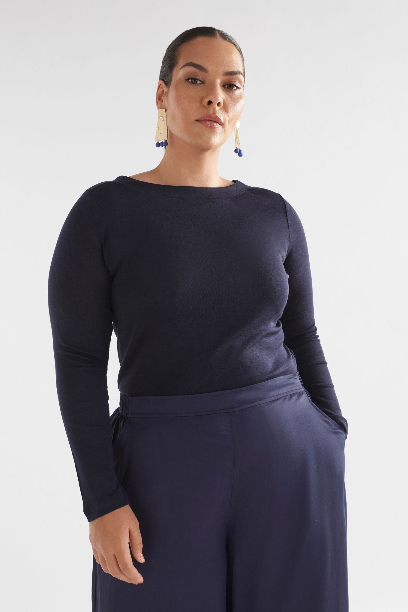 Elk Grej top lightweight merino wool knit long sleeve top in dark navy blue.