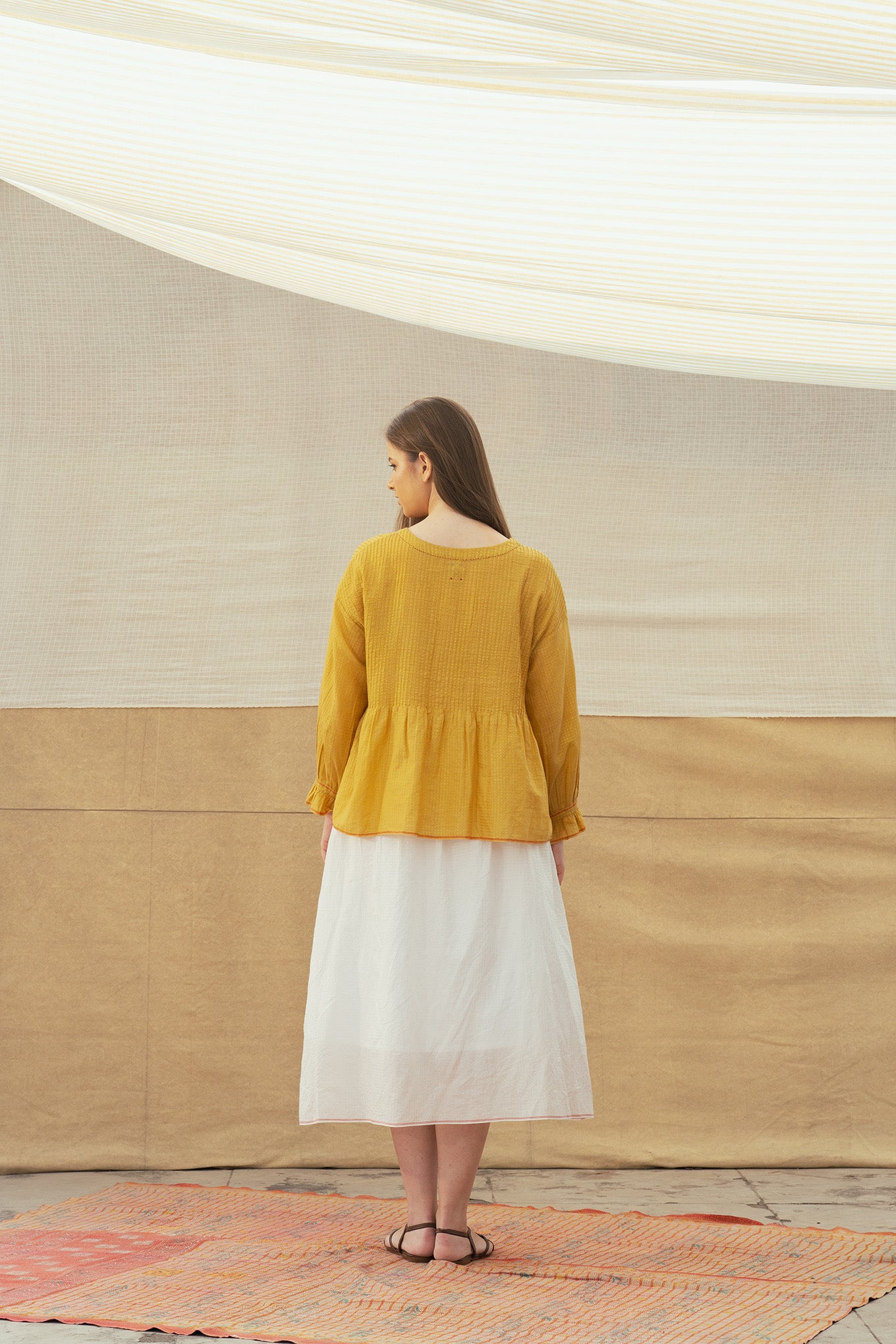 Dve Ruhi one size silk cotton top with gathered cuff and bodice pintucks.