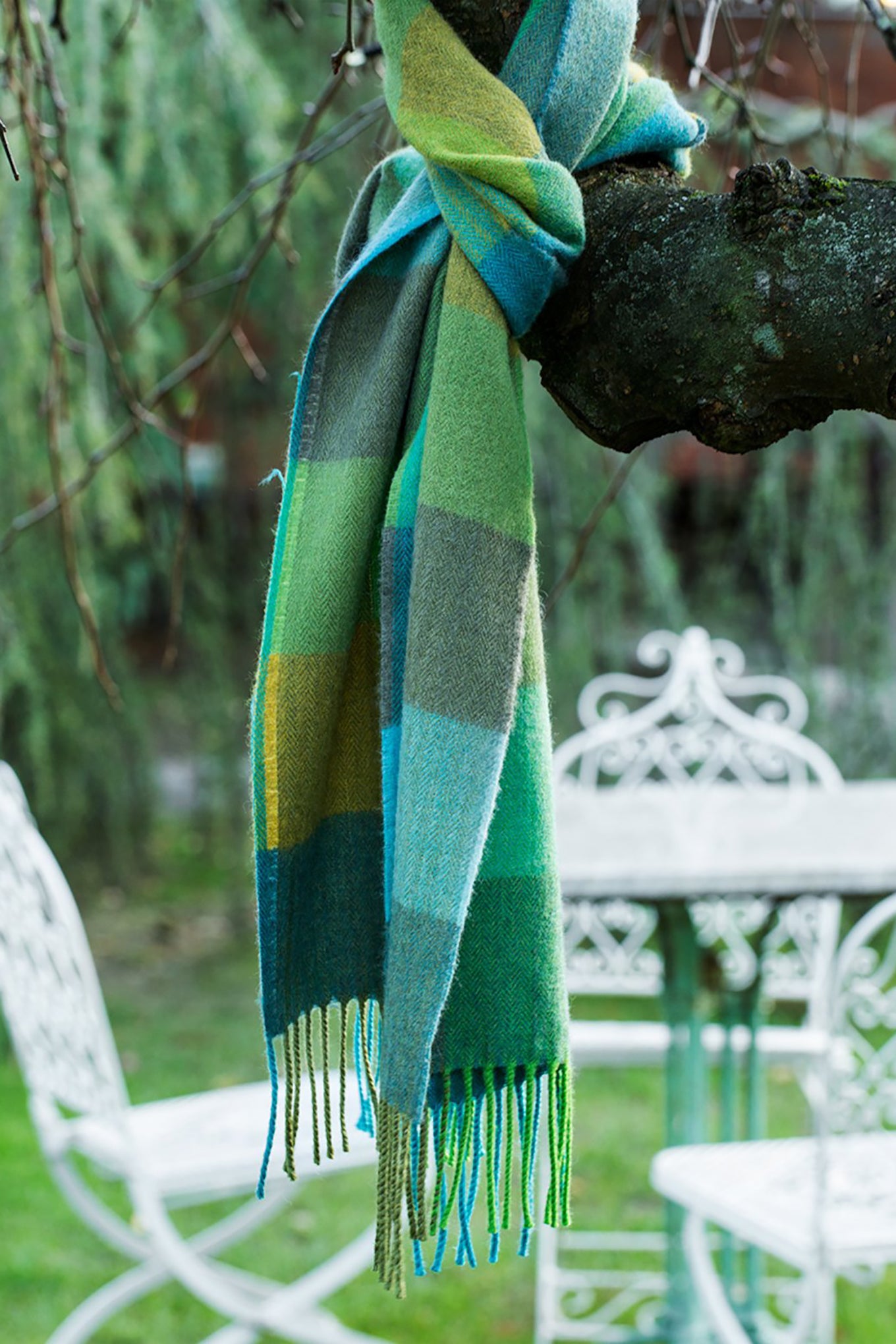 Avoca the Mill made in Ireland merino wool scarf in green fields, green checks with bright blue contrast.