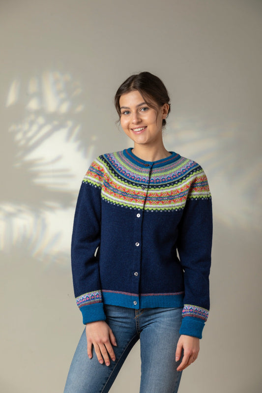 Eribe Scottish fairisle Alpine short cropped cardigan in Aurora, navy with fairisle in lime green, pink, orange and lavender fairisle.