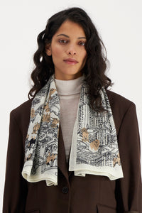 Inoui  Editions wool square scarf featuring map of Central Park New York with dogs, black and latte on wool white.