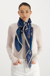 Inoui  Editions wool square scarf featuring map of Central Park New York with dogs, shades of blue and wool white.