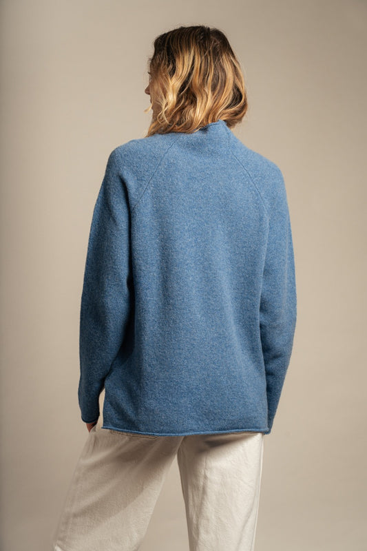 Eribe pure merino wool Corry raglan sweater in blue jeans denim.