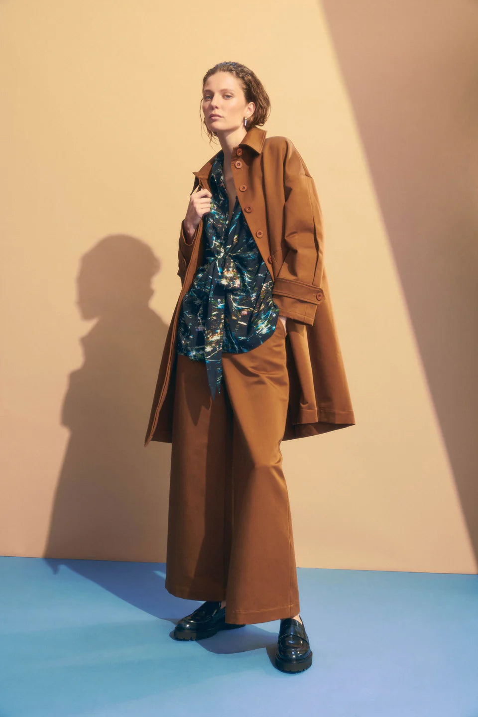 Elk Talli organic cotton coat in cinnamon brown.