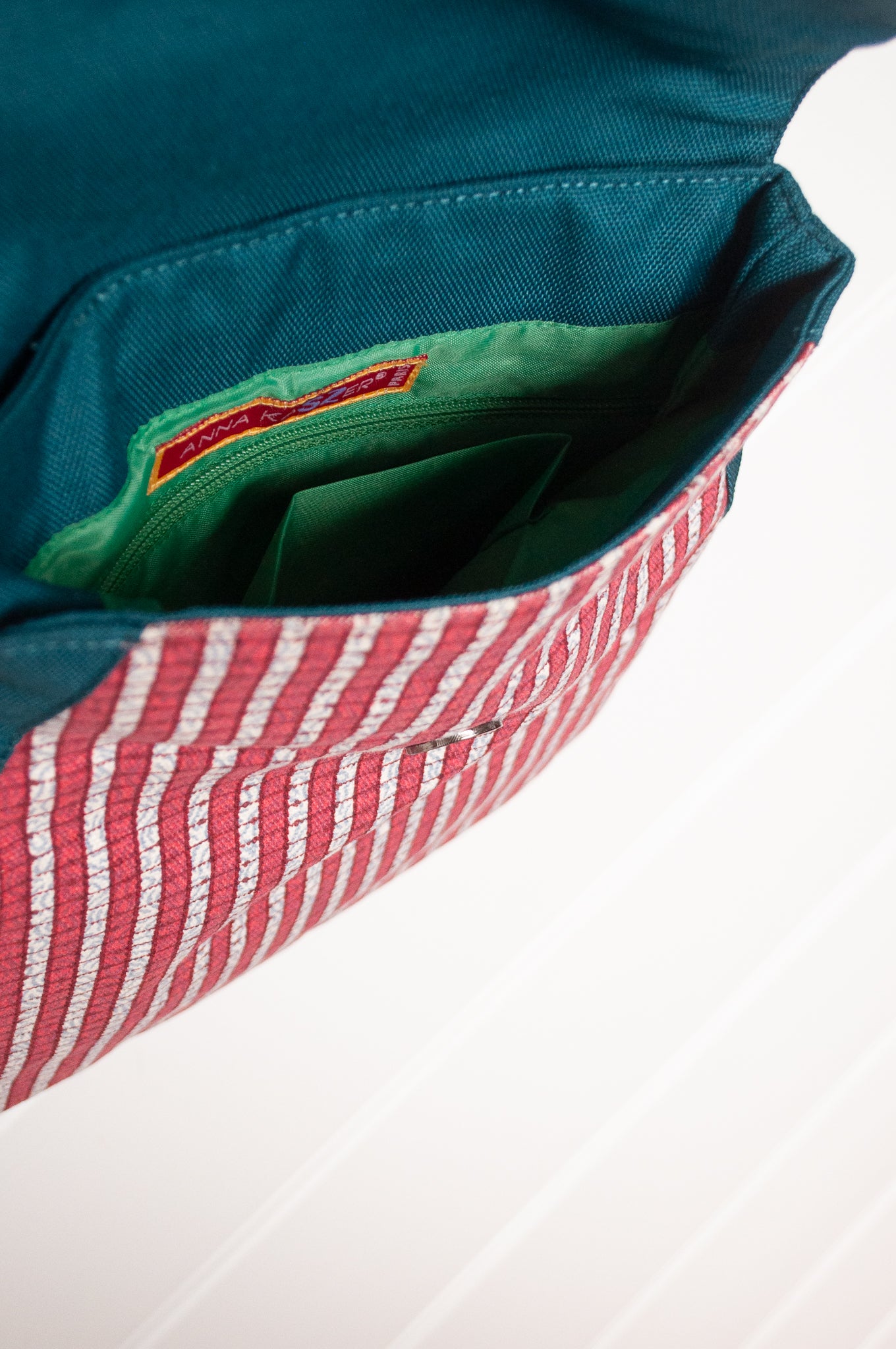 Anna Kaszer cotton canvas Samara crossbody bag in red and green.
