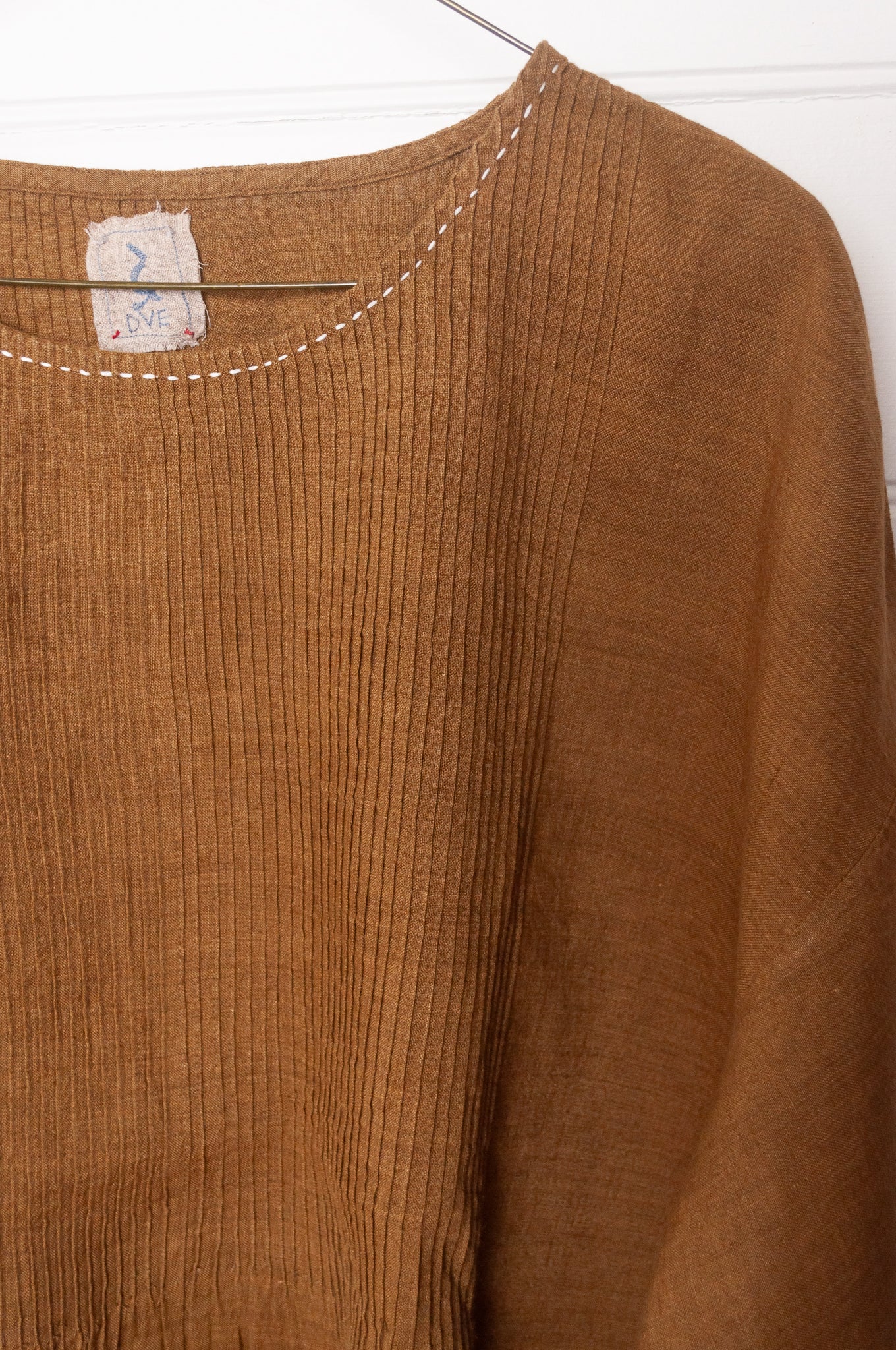 Dve one size pintucked linen Anisha top in mustard.
