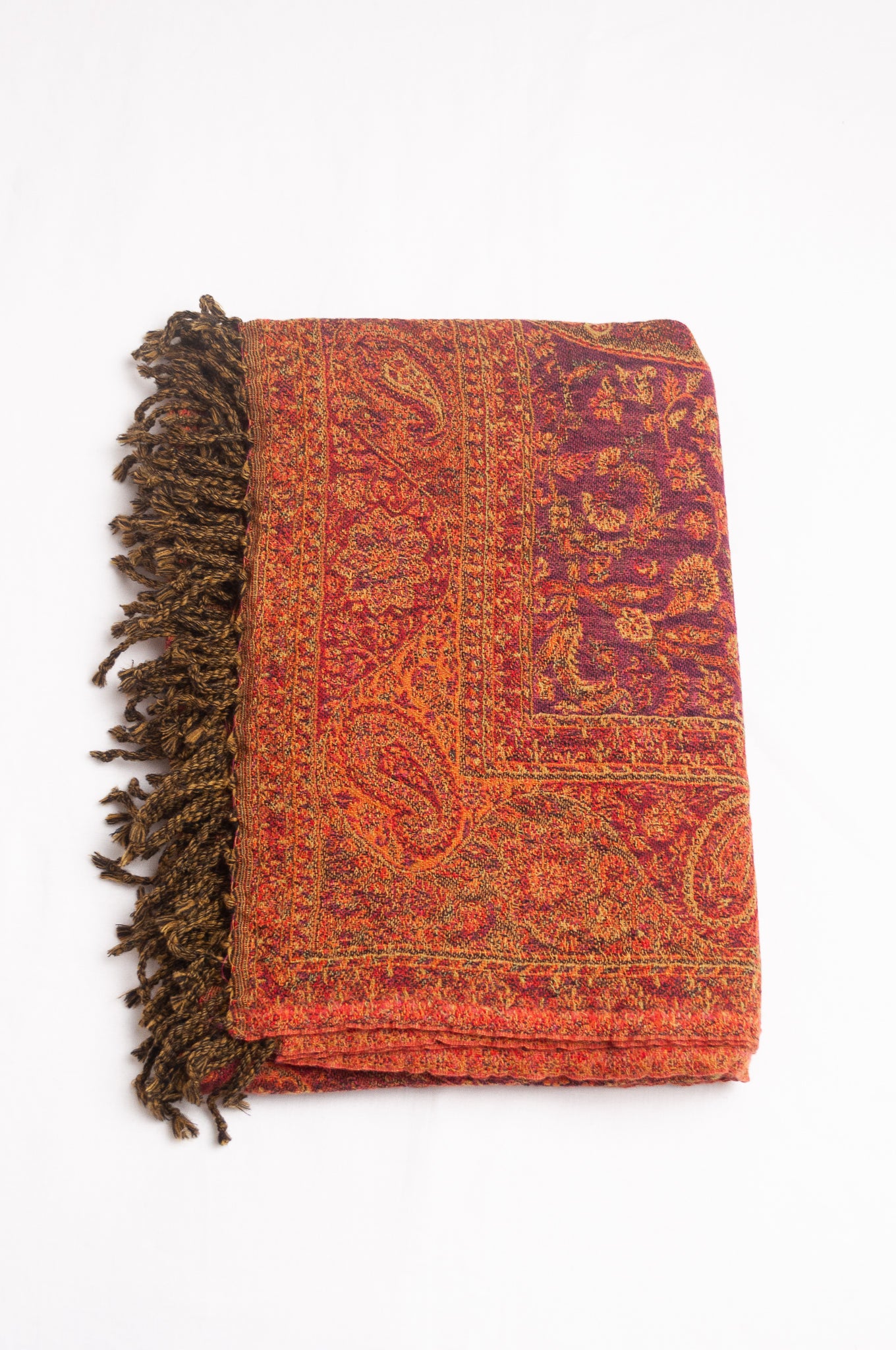 Tasseled wool throw - tamarind paisley
