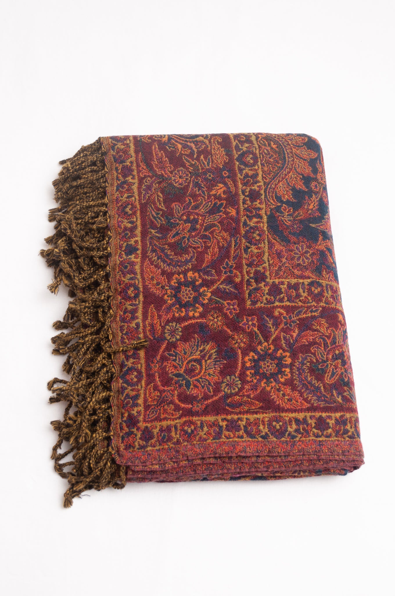 Juniper Hearth pure wool paisley and floral taseeled throw rug in purple and lilac.