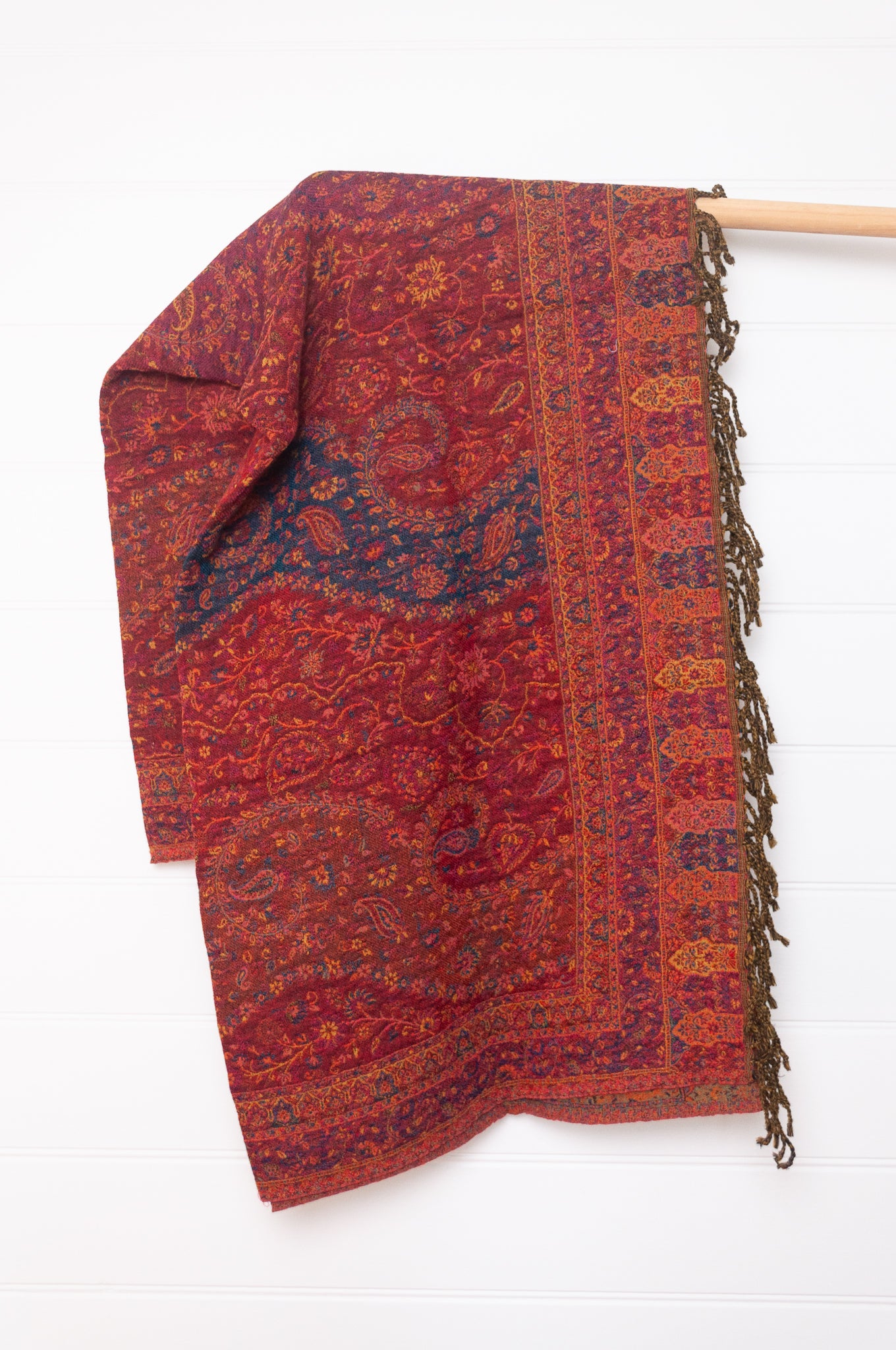 Tasseled wool throw - ruby paisley flower
