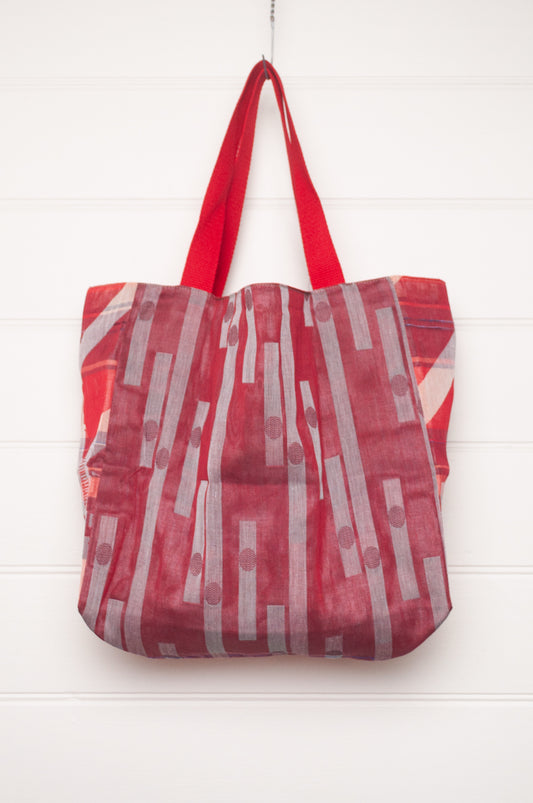 Letol organic cotton jacquard weave tote bag in foliage and stripes in red and pink.