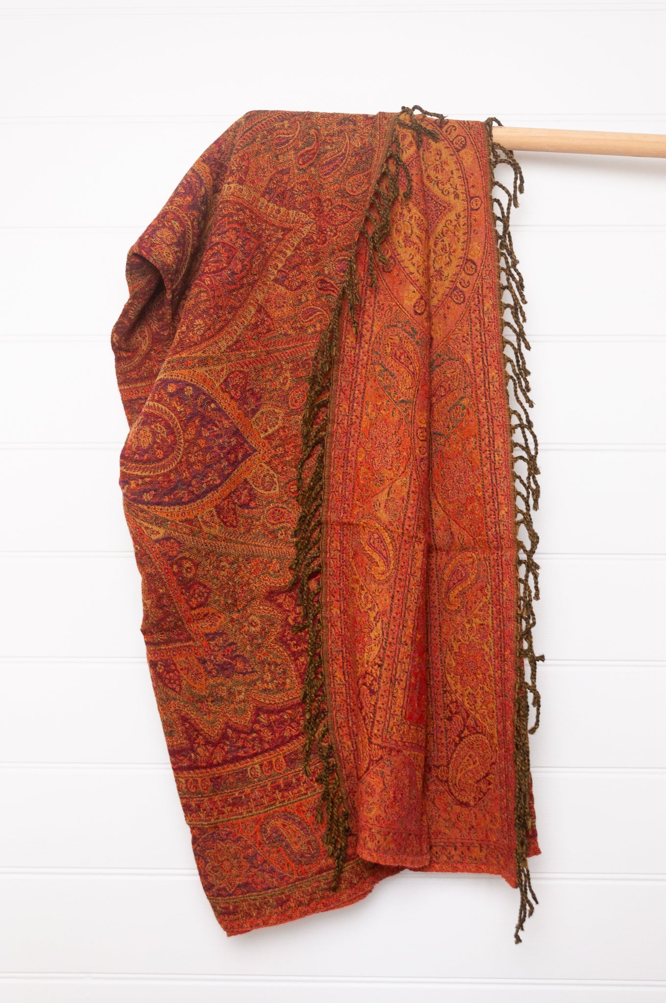 Tasseled wool throw - tamarind paisley