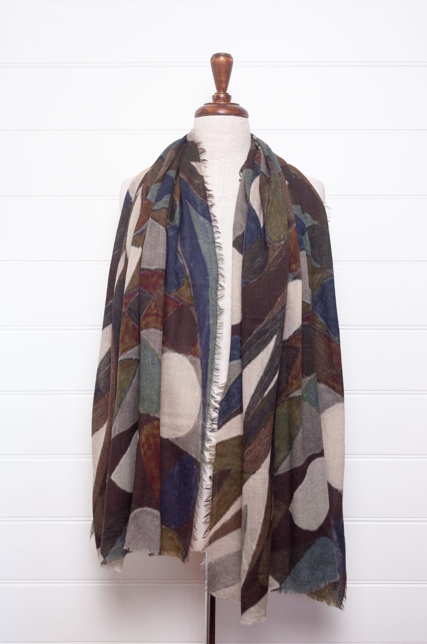 Fine wool modal scarf in blues and browns abstract print.