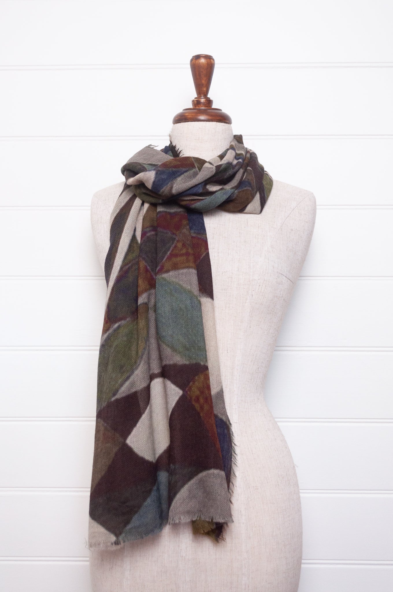 Fine wool modal scarf in blues and browns abstract print.