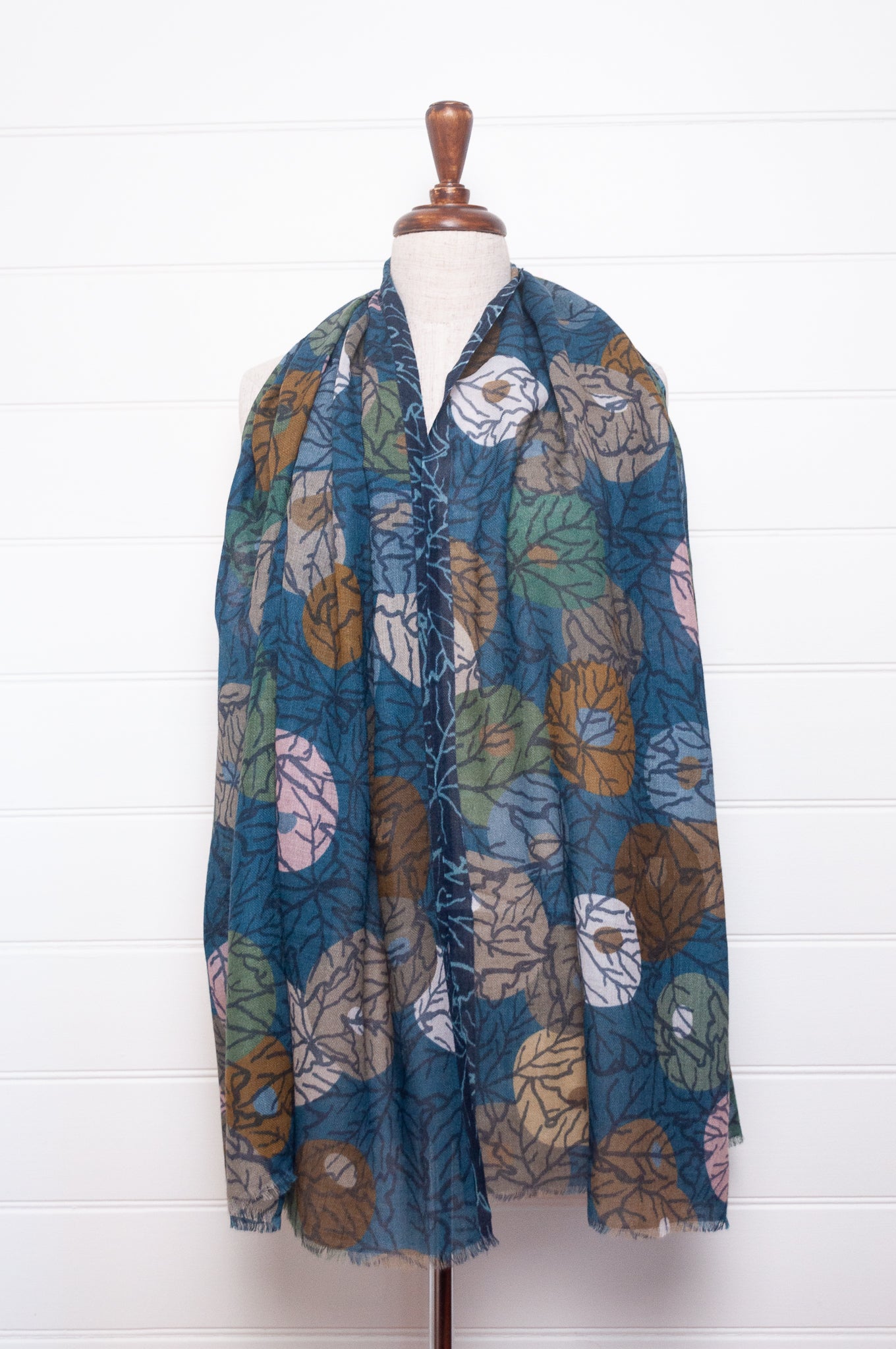 Fine wool modal scarf in winter tones featuring berry print.