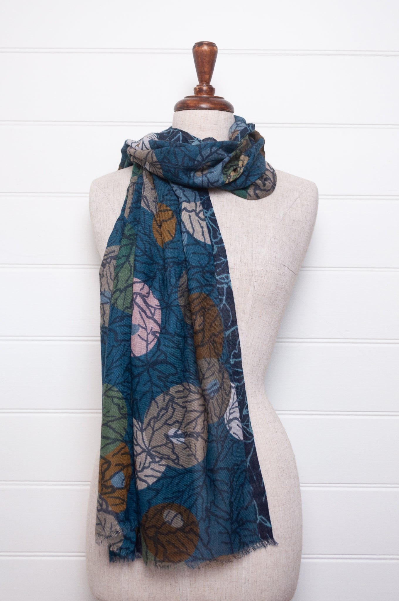 Fine wool modal scarf in winter tones featuring berry print.