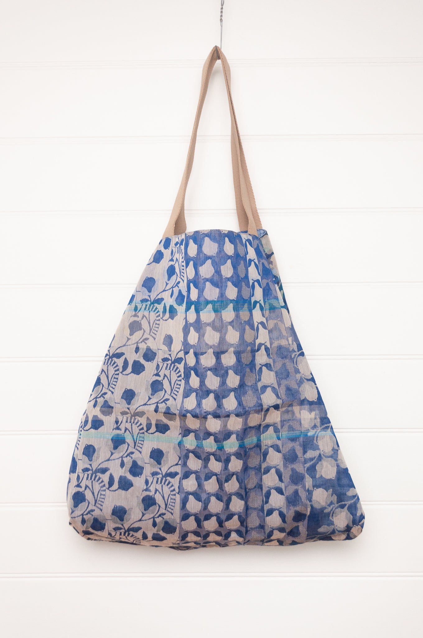 Letol organic cotton jacquard weave large tote bag in flowers and foliage in cobalt and sapphire blue.