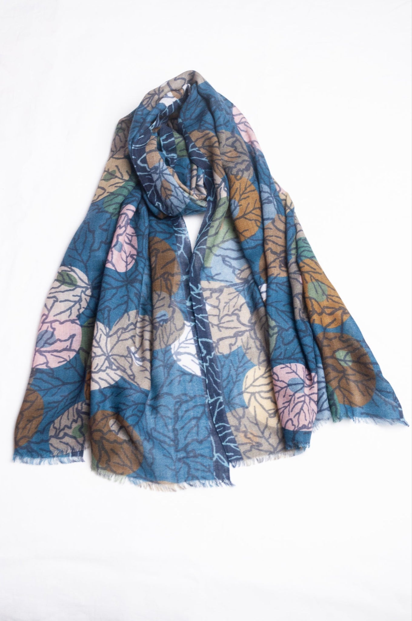 Fine wool modal scarf in winter tones featuring berry print.