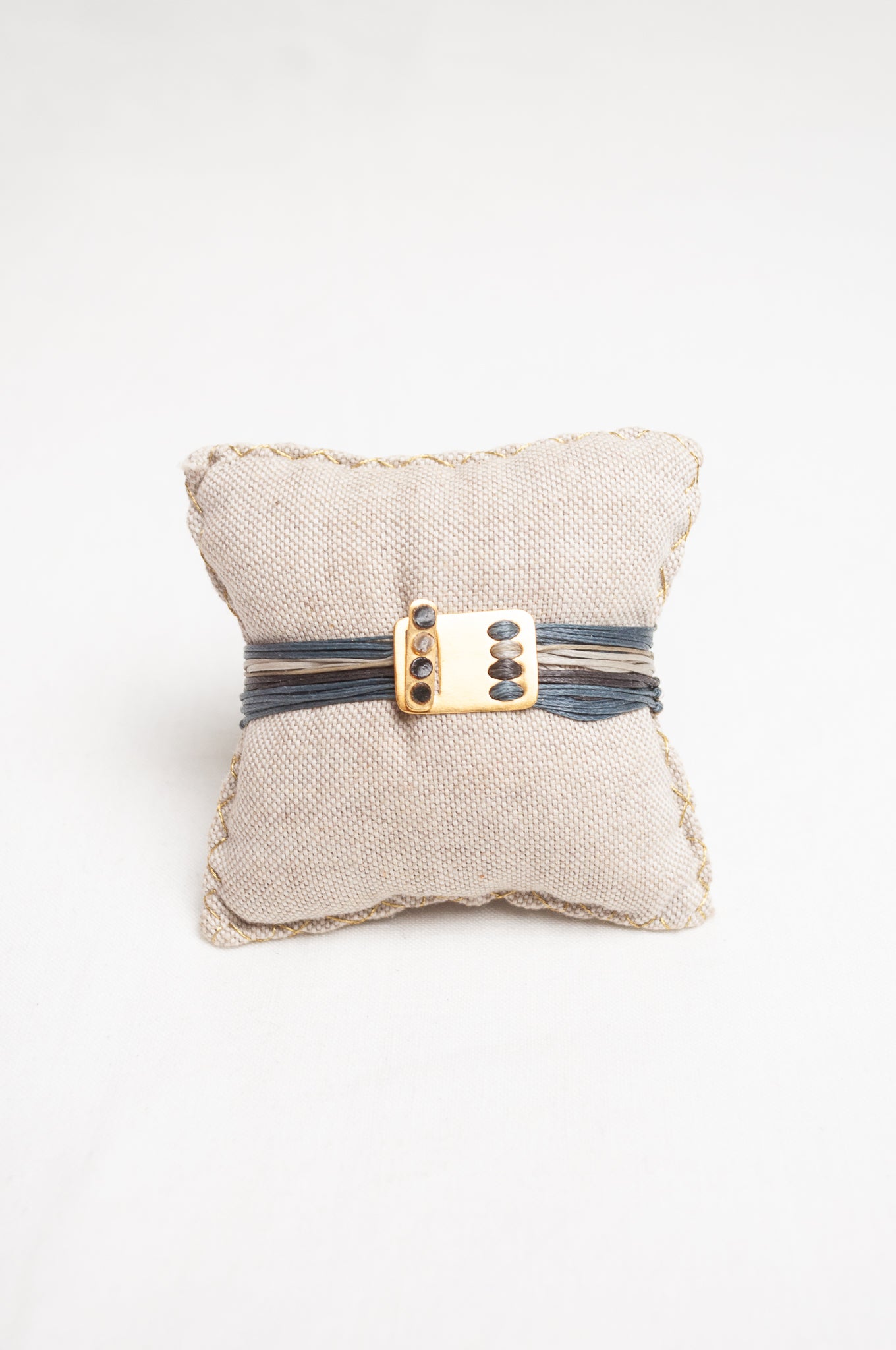Mary Gaitani made in Greece waxed cord bracelet with gold charms and semi-precious stones.