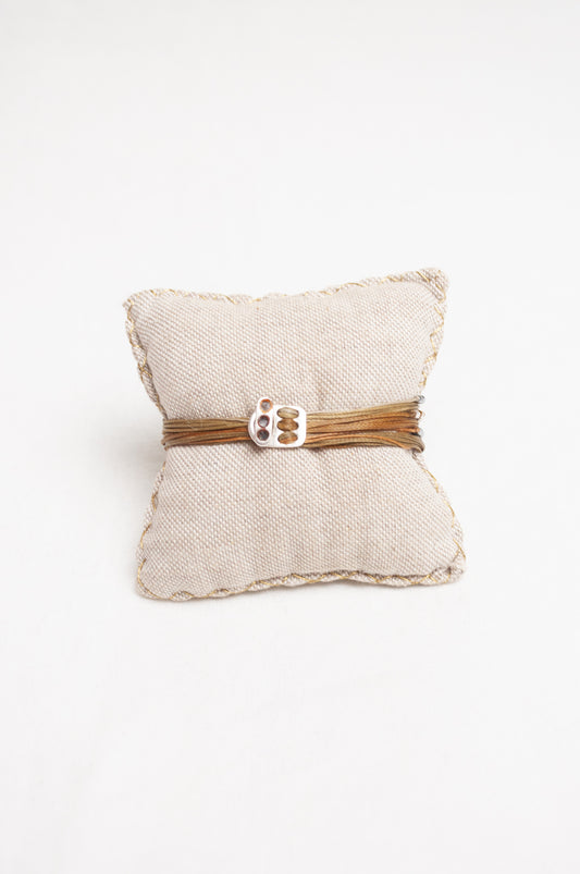 Mary Gaitani made in Greece waxed cord bracelet with silver and gold charms and semi-precious stones.