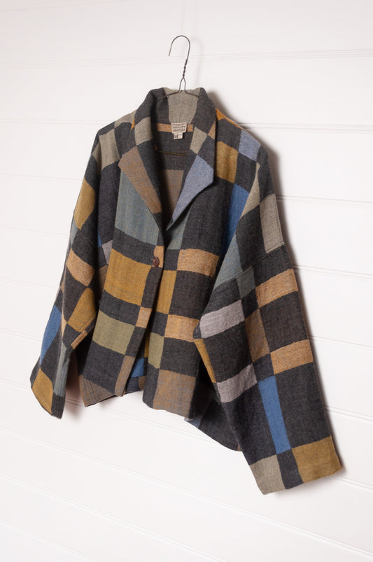 NK Coco handwoven wool jacket in charcoal and cool winter shades blanket checks.