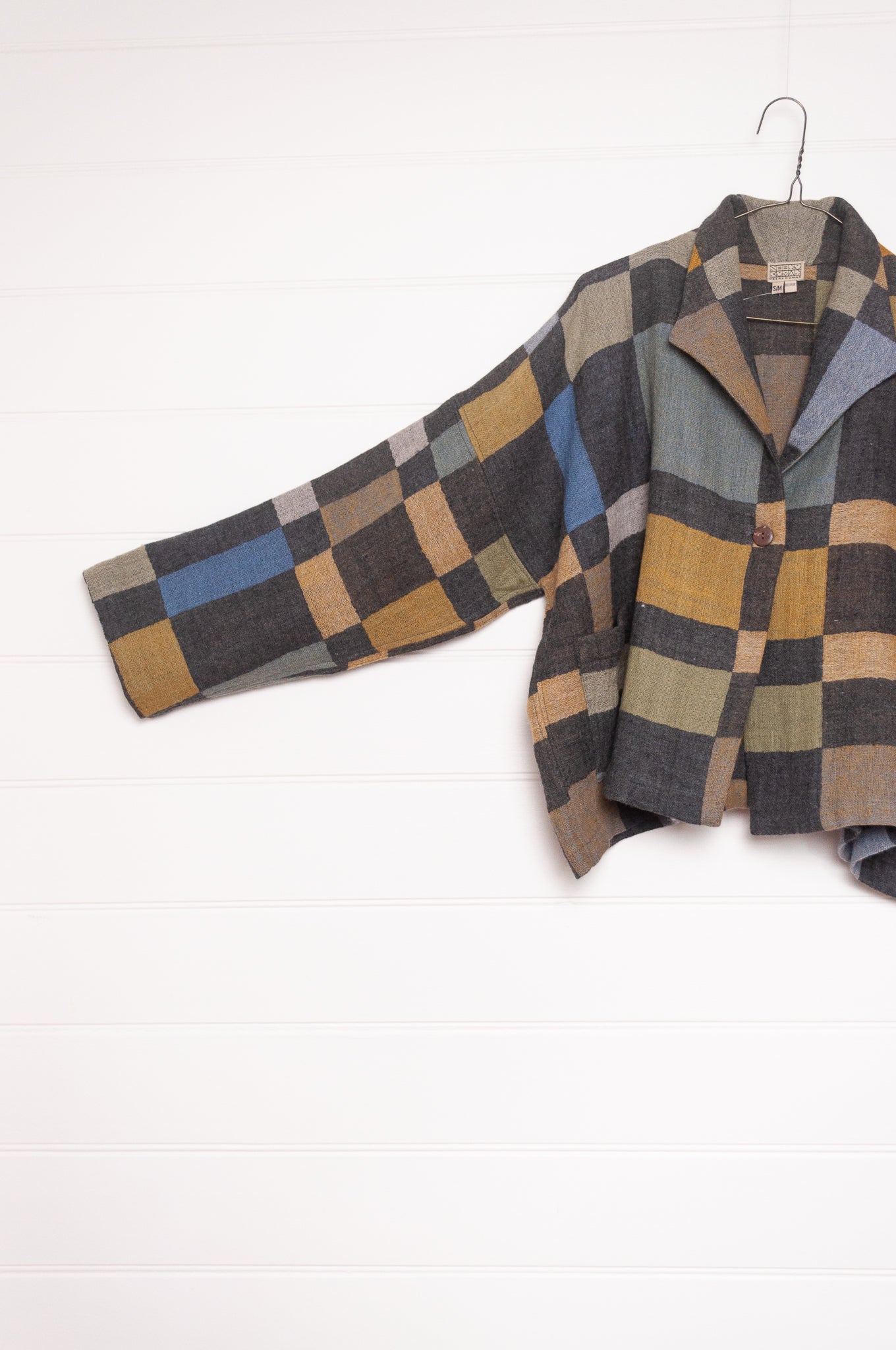 NK Coco handwoven wool jacket in charcoal and cool winter shades blanket checks.