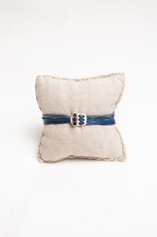 Mary Gaitani made in Greece waxed cord bracelet with silver charms.