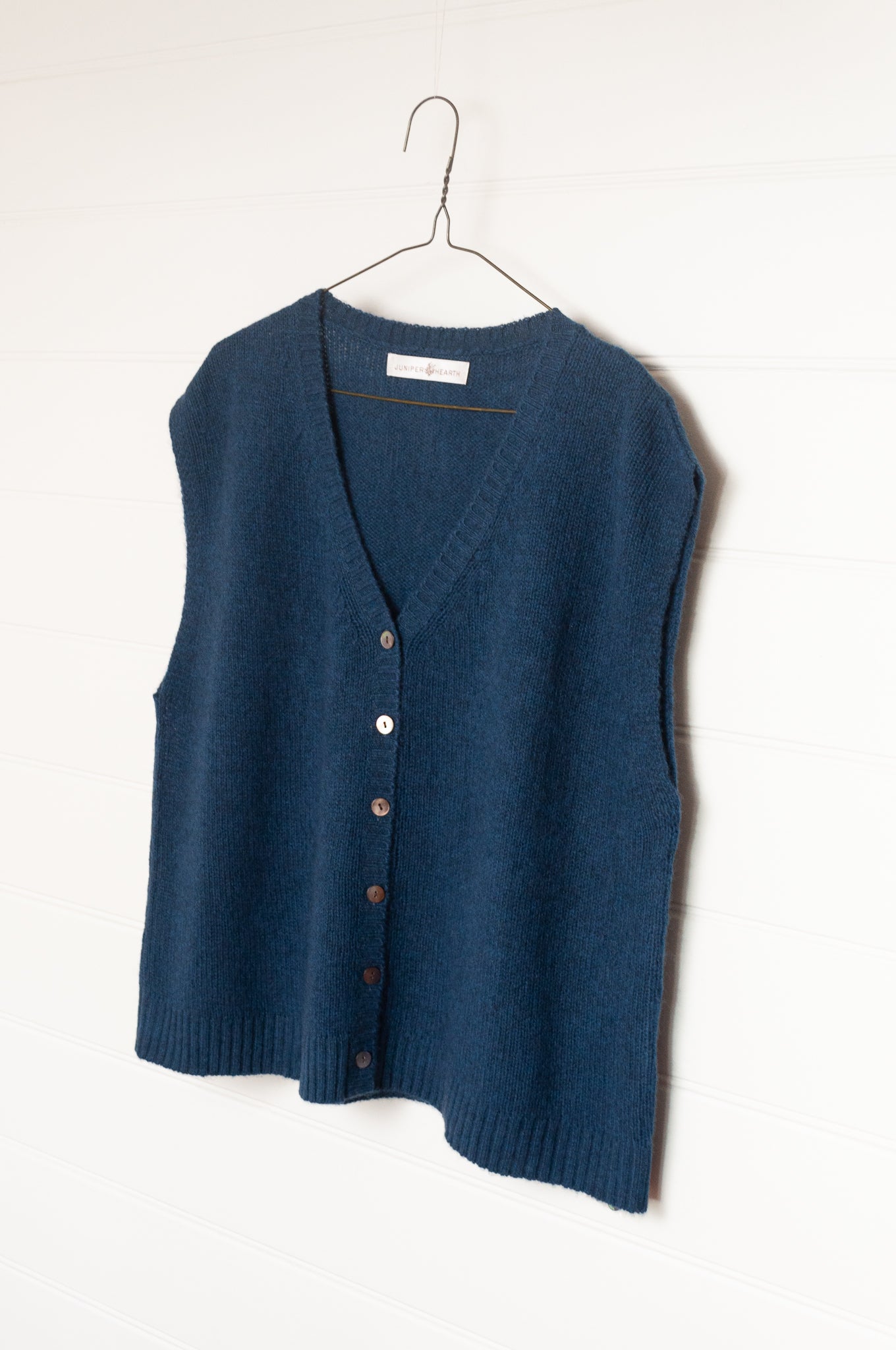 Baby yak wool light denim blue wool knitted button up V-neck vest.