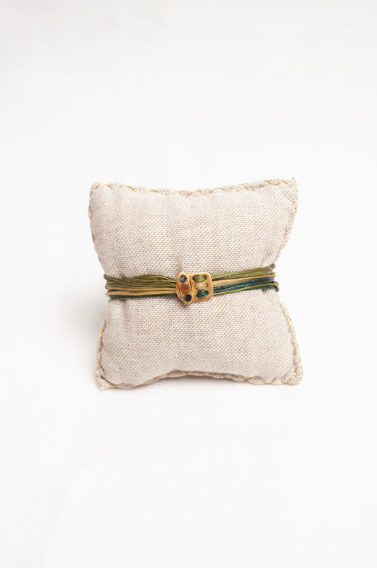 Mary Gaitani made in Greece waxed cord bracelet with gold charms and semi-precious stones.