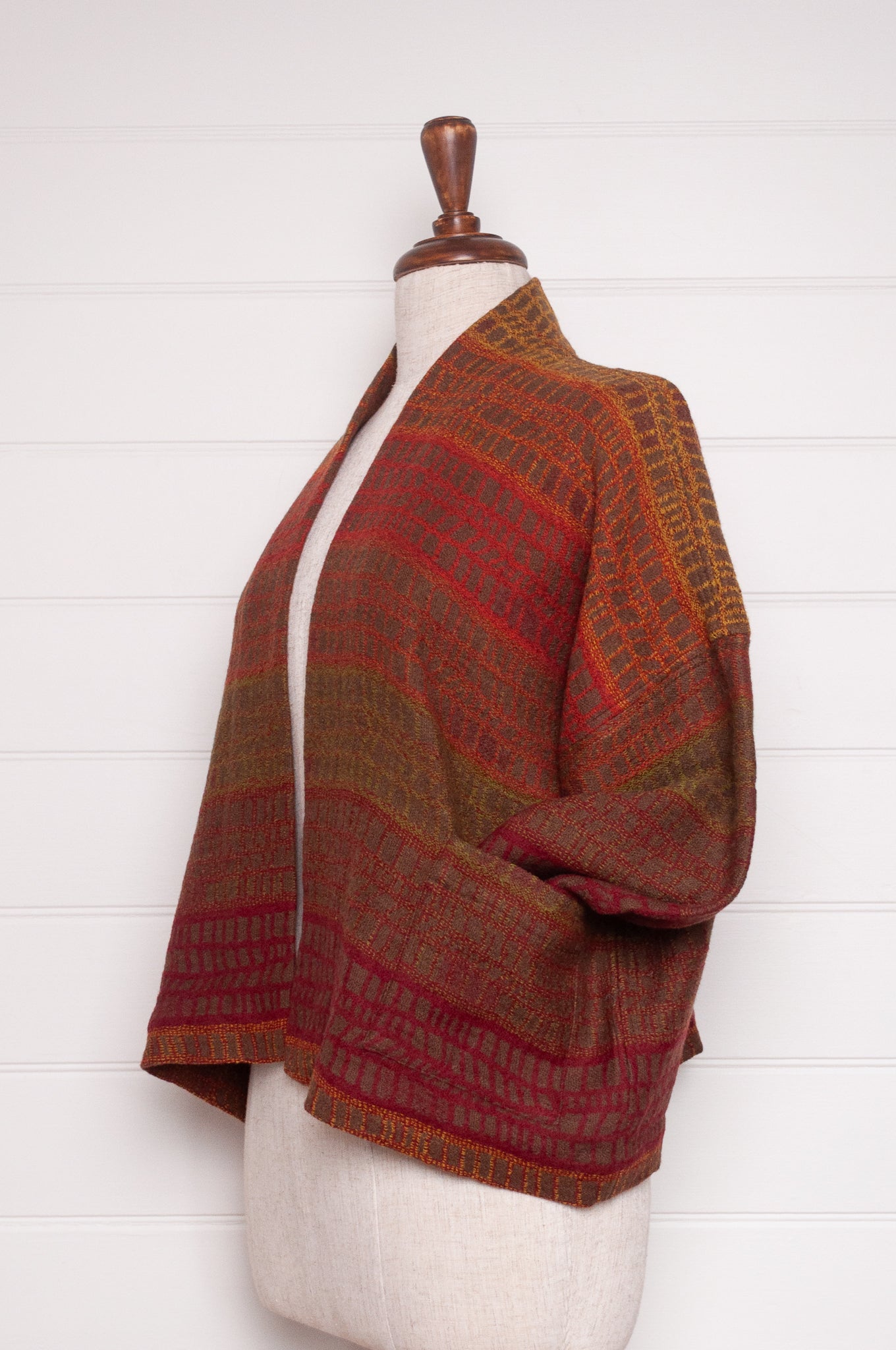 NK handwoven wool cropped kimono jacket in patterned stripes in autumn tones.
