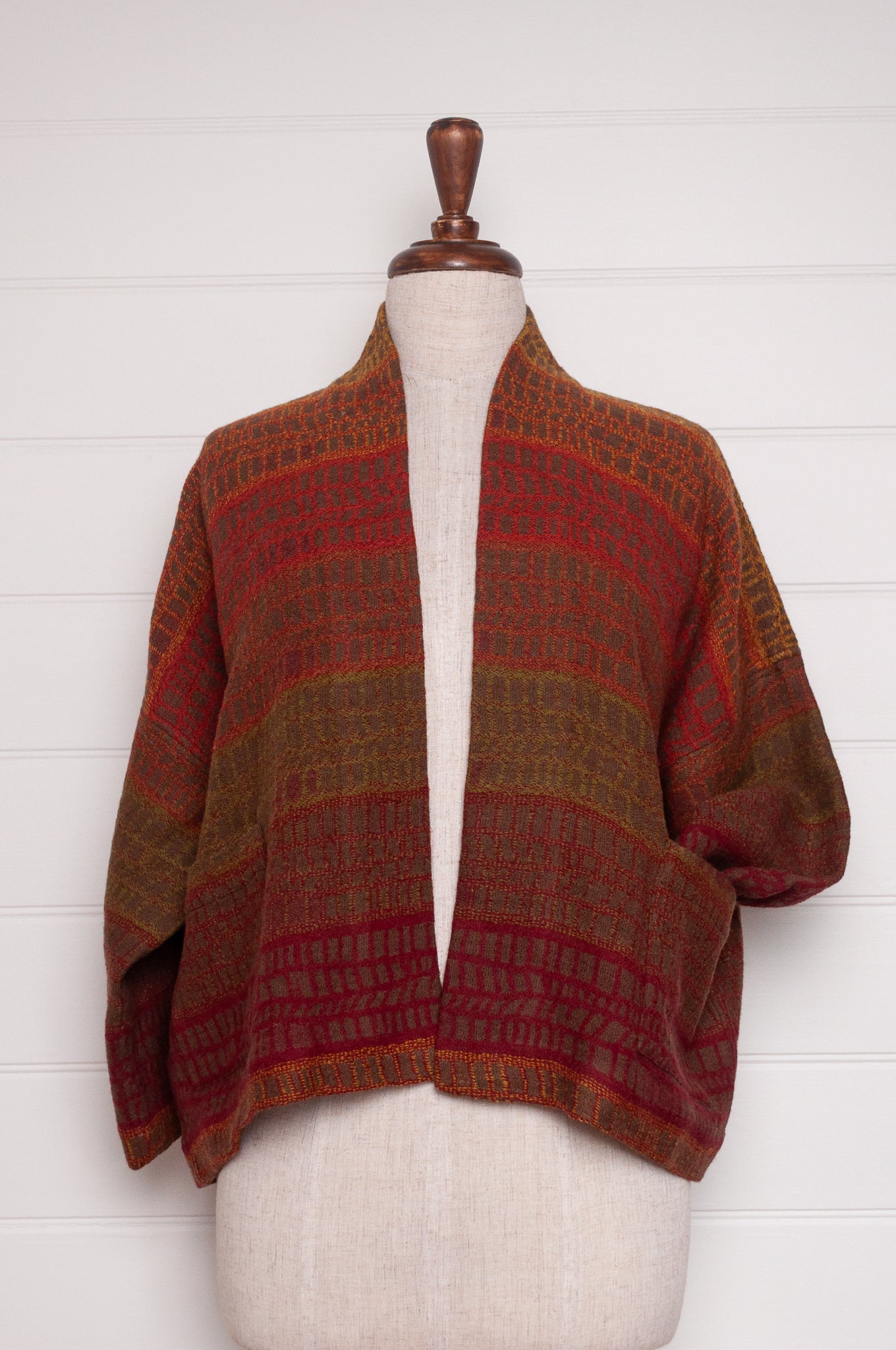 NK handwoven wool cropped kimono jacket in patterned stripes in autumn tones.