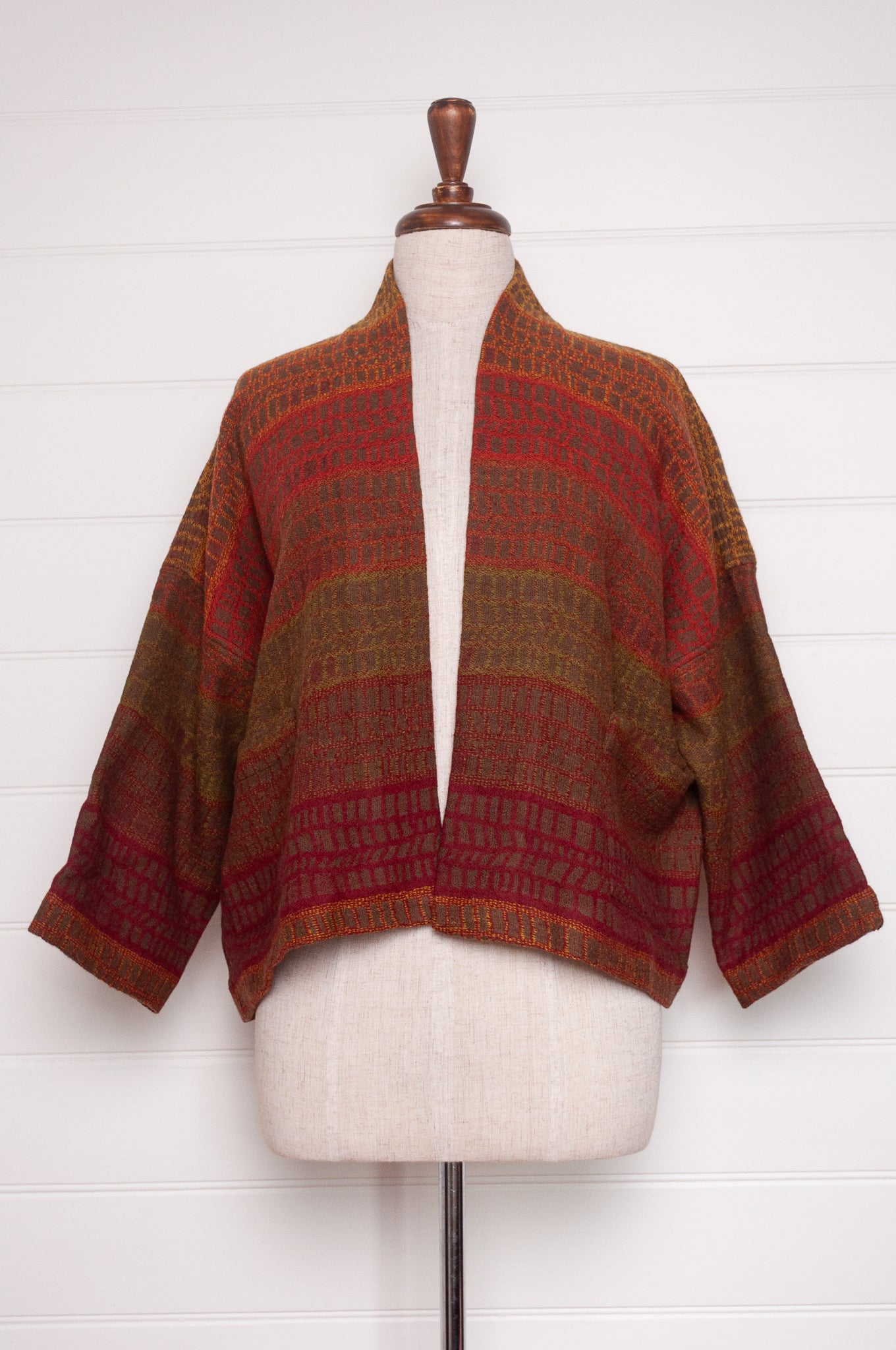 NK handwoven wool cropped kimono jacket in patterned stripes in autumn tones.