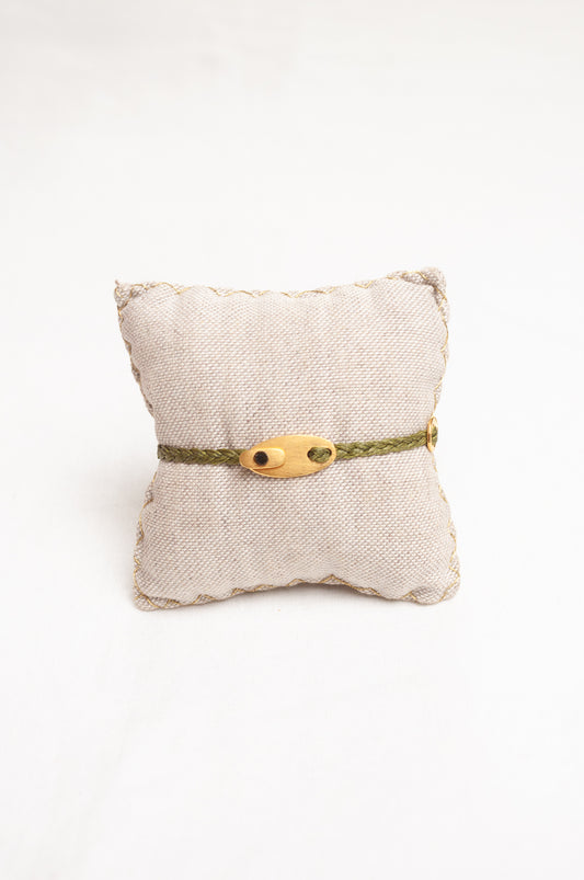 Mary Gaitani made in Greece plaited waxed cord bracelet with gold buckle charms.