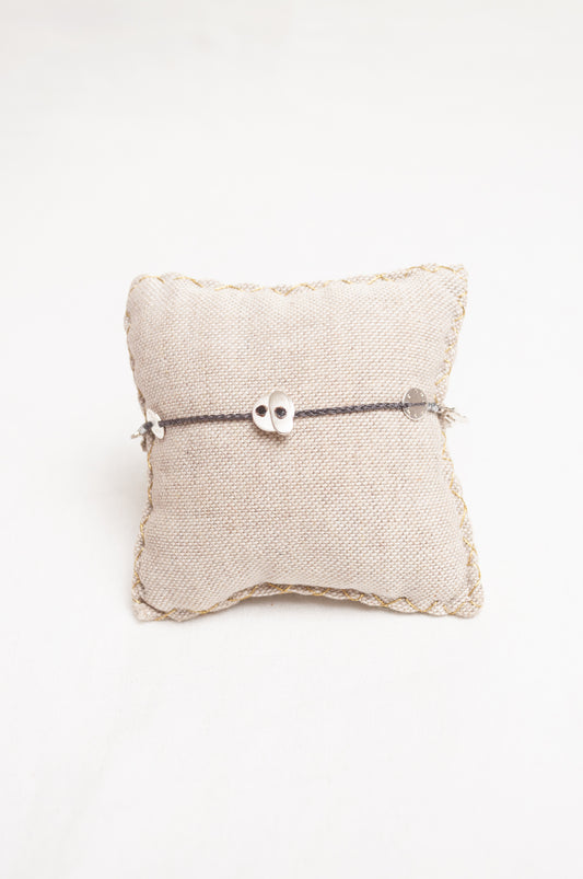 Mary Gaitani made in Greece waxed cord bracelet with silver charms and semi-precious stones.