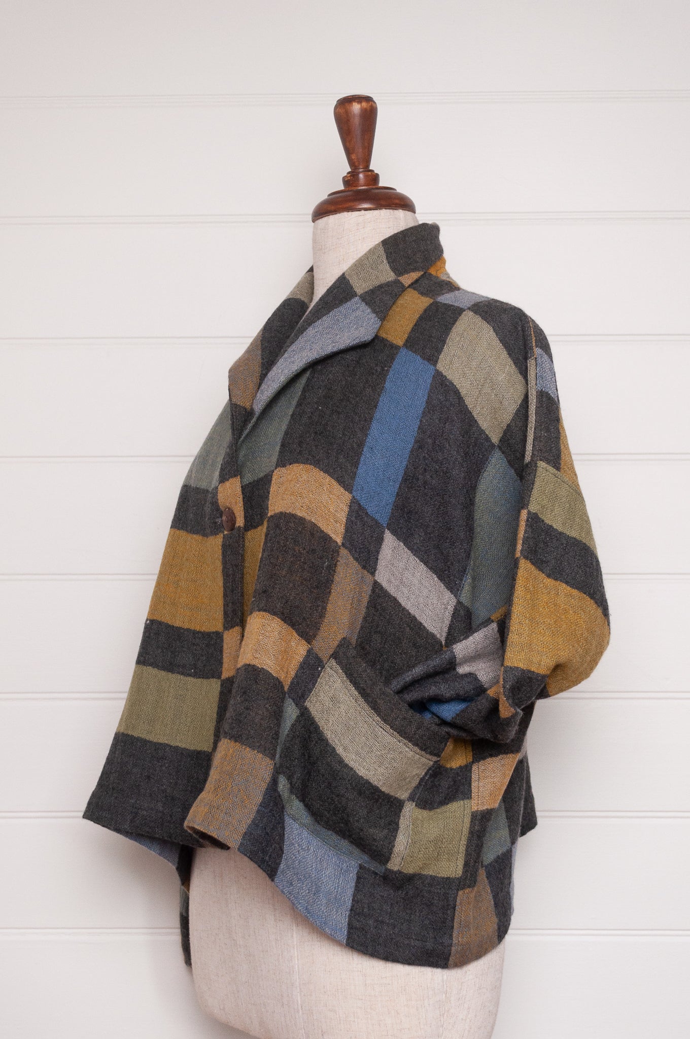 NK Coco handwoven wool jacket in charcoal and cool winter shades blanket checks.