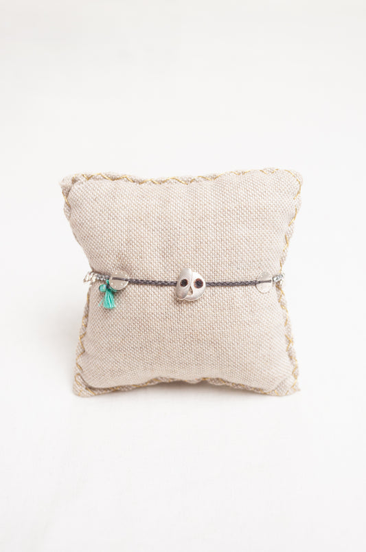 Mary Gaitani made in Greece waxed cord bracelet with silver charms, semi-precious stones and tiny tassel.