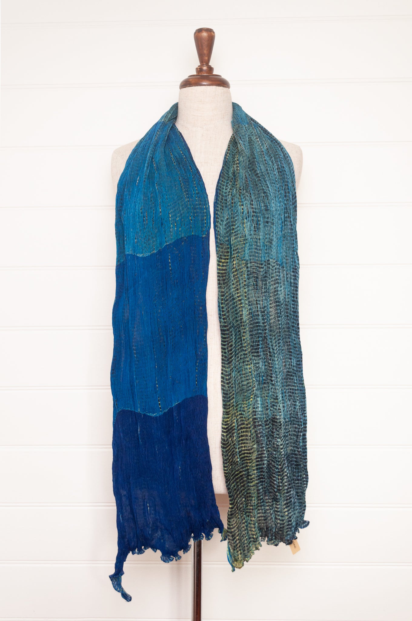 Neeru Kumar crinkle silk shibori scarf in cobalt blue and turquoise with a speckled print.