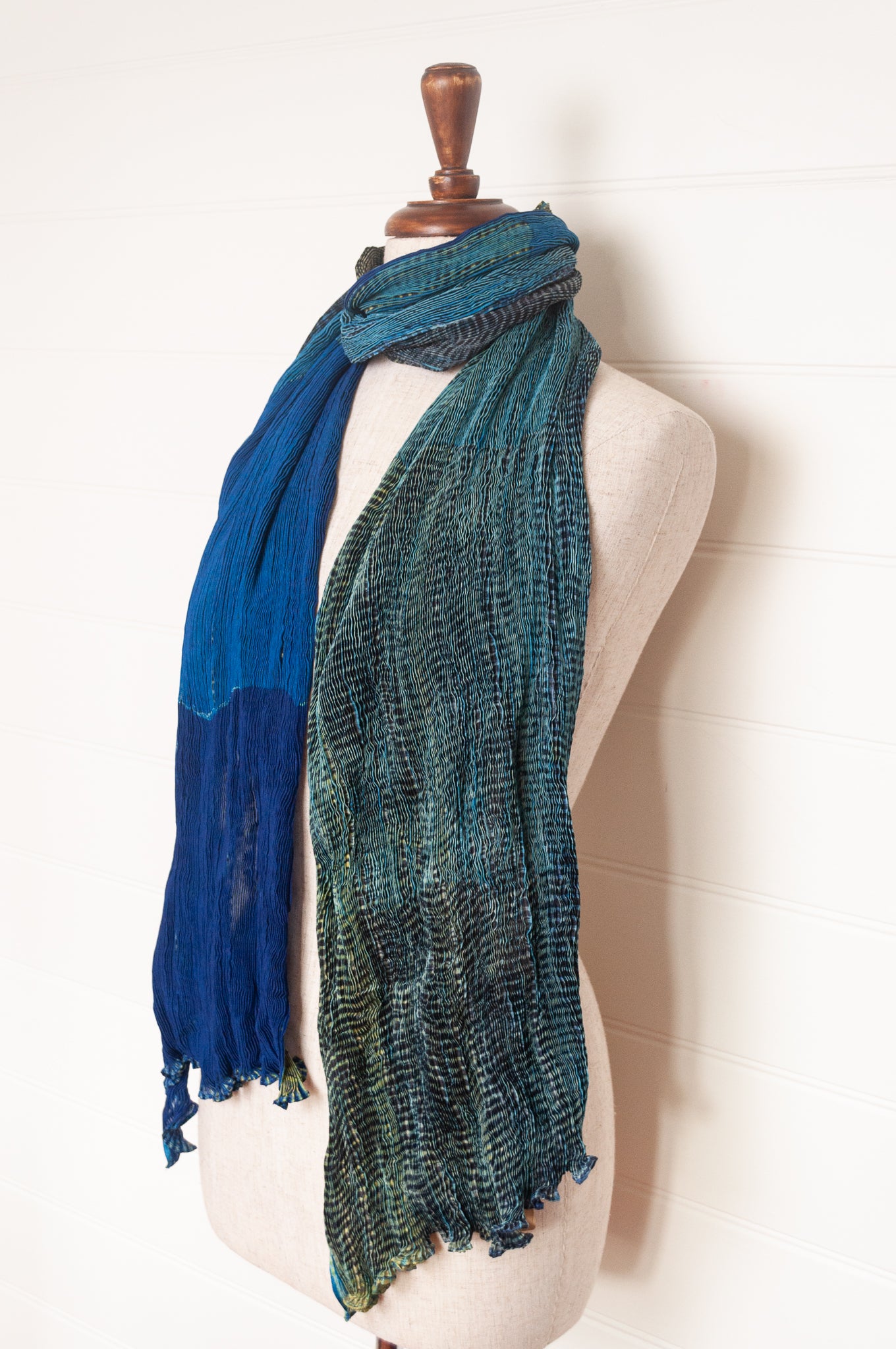 Neeru Kumar crinkle silk shibori scarf in cobalt blue and turquoise with a speckled print.