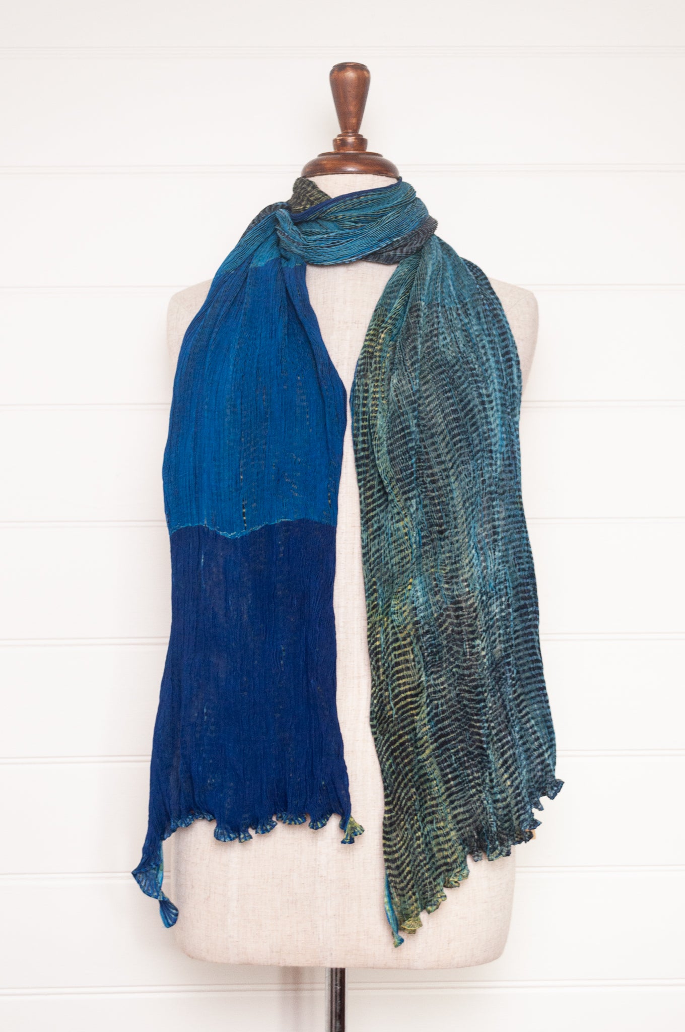 Neeru Kumar crinkle silk shibori scarf in cobalt blue and turquoise with a speckled print.