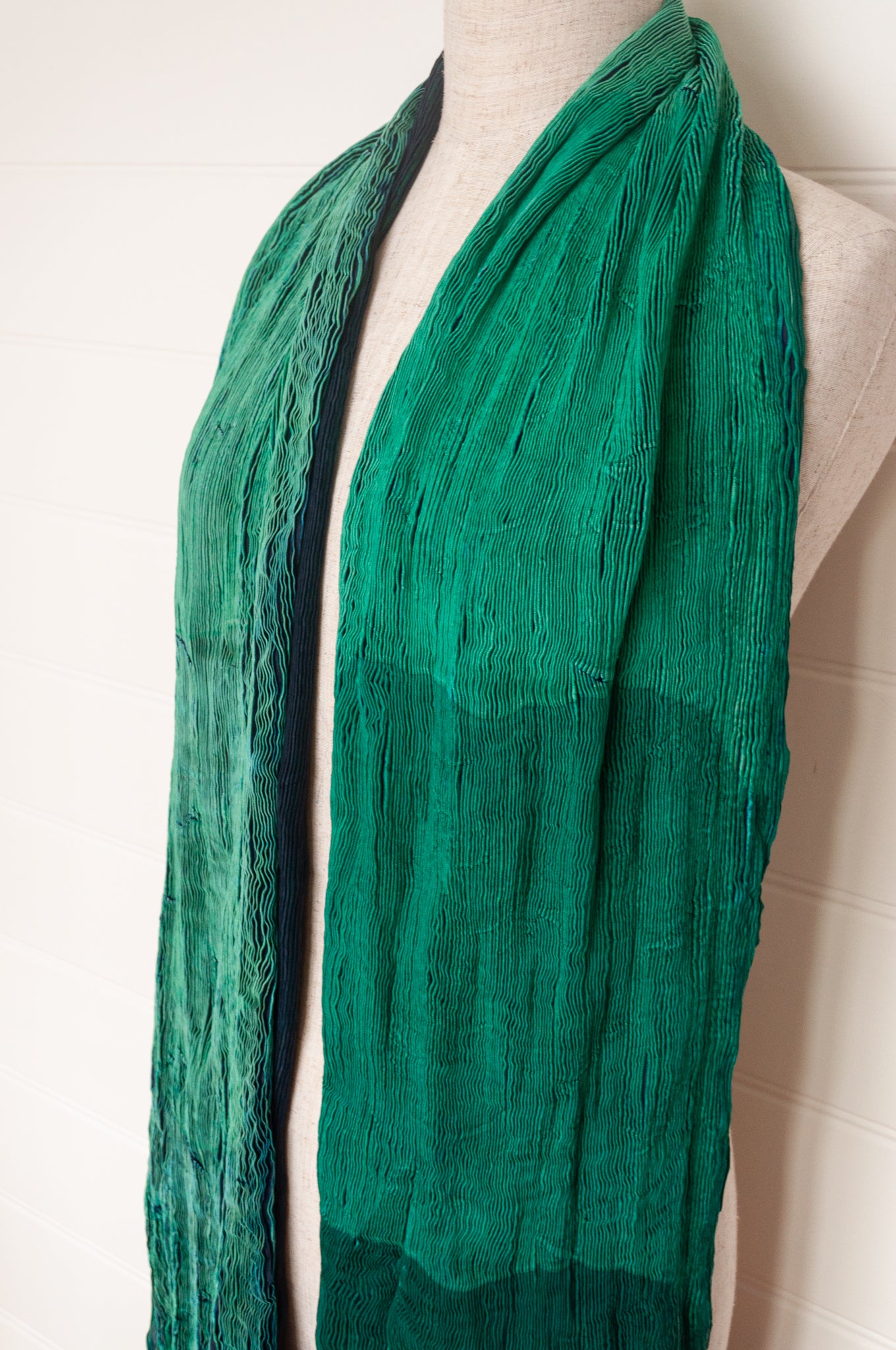 Neeru Kumar crinkle silk shibori scarf in deep blues, emerald and aqua greens.