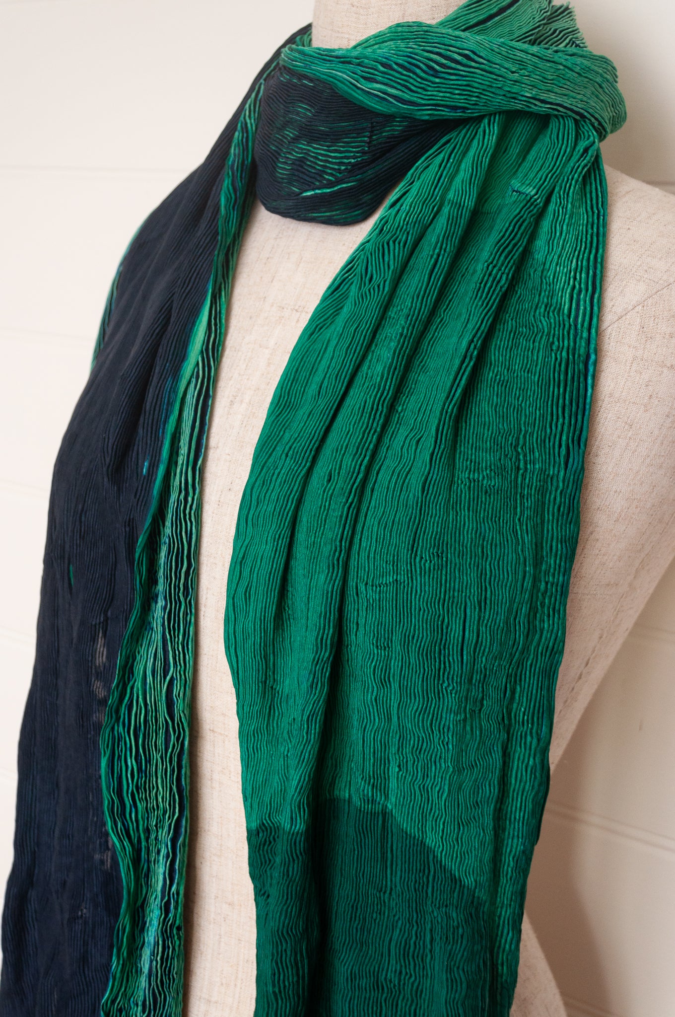 Neeru Kumar crinkle silk shibori scarf in deep blues, emerald and aqua greens.