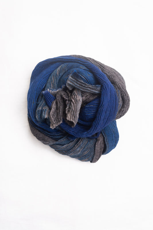 NK Shibori dyed wool scarf in cobalt blue and charocal, pleat finish.