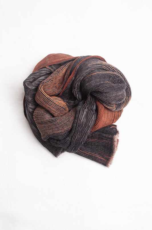 NK Shibori dyed wool scarf in chestnut brown and charocal, pleat finish.