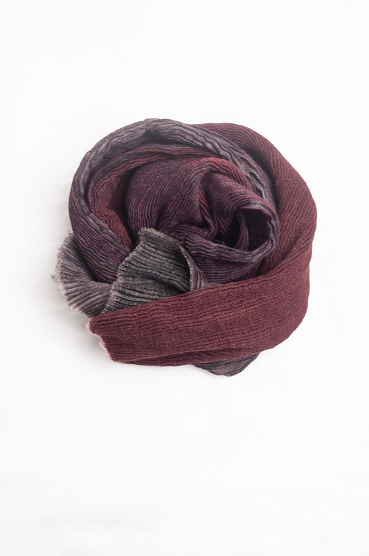 NK Shibori dyed wool scarf in wine red and charocal, pleat finish.