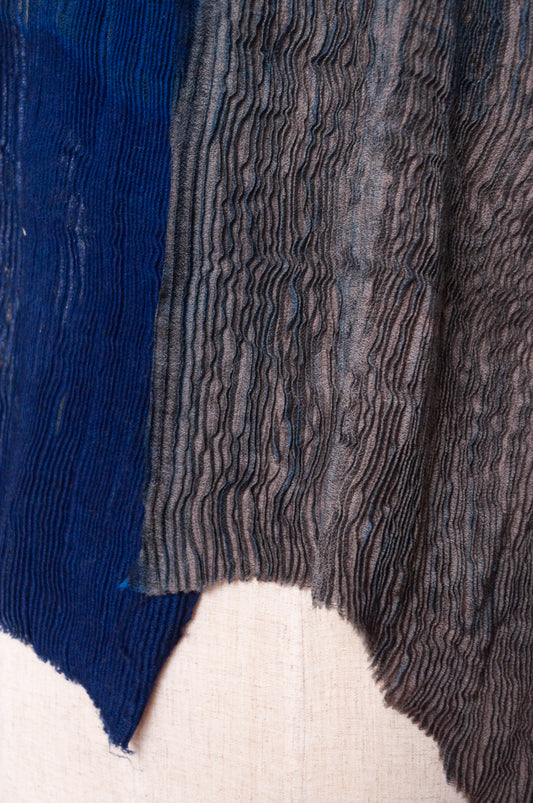 NK Shibori dyed wool scarf in cobalt blue and charocal, pleat finish.