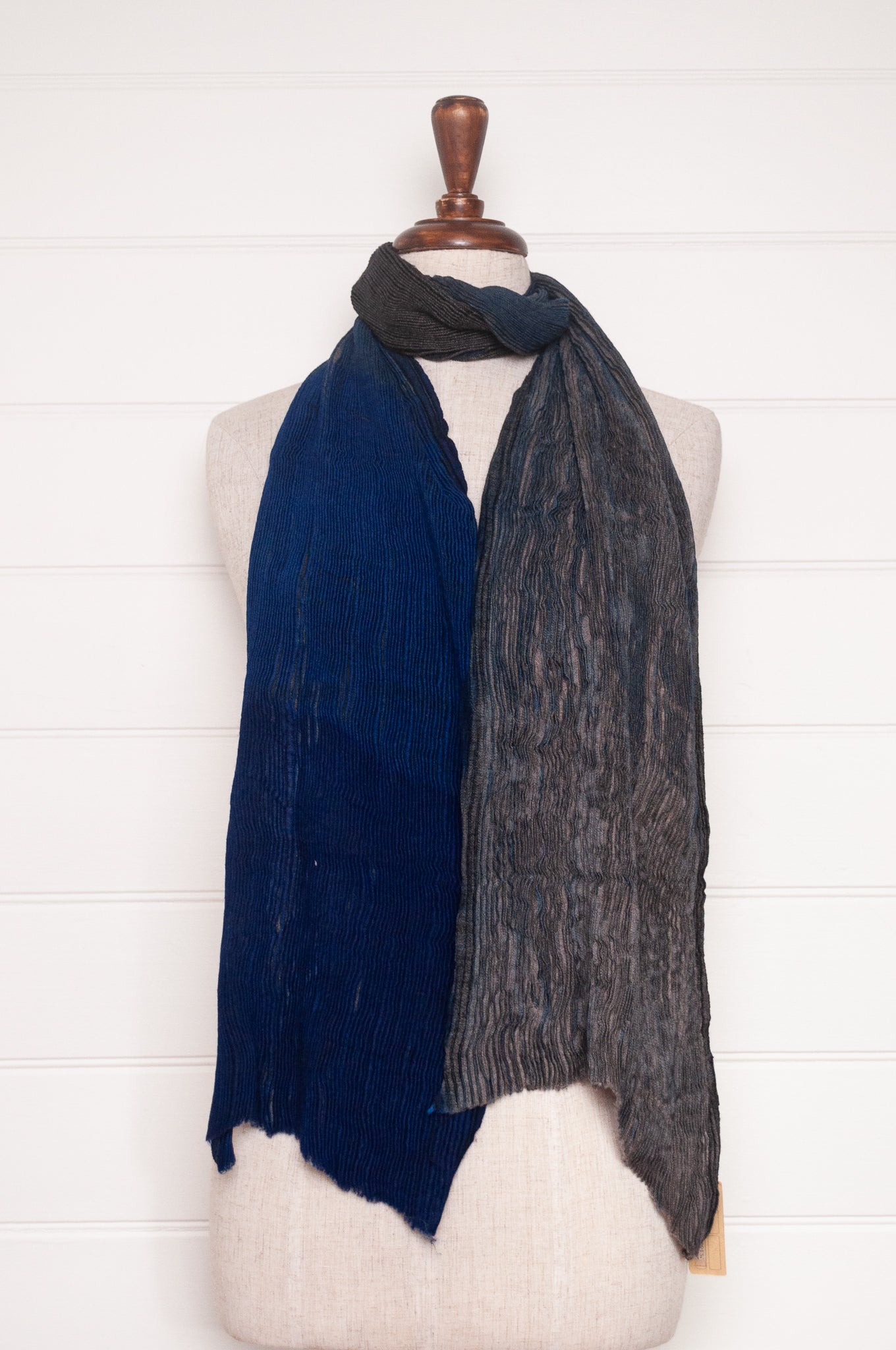 NK Shibori dyed wool scarf in cobalt blue and charocal, pleat finish.