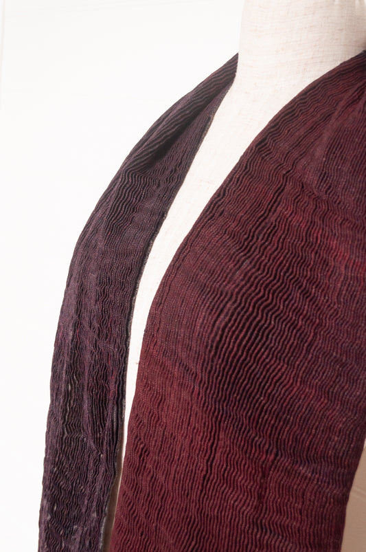 NK Shibori dyed wool scarf in wine red and charocal, pleat finish.