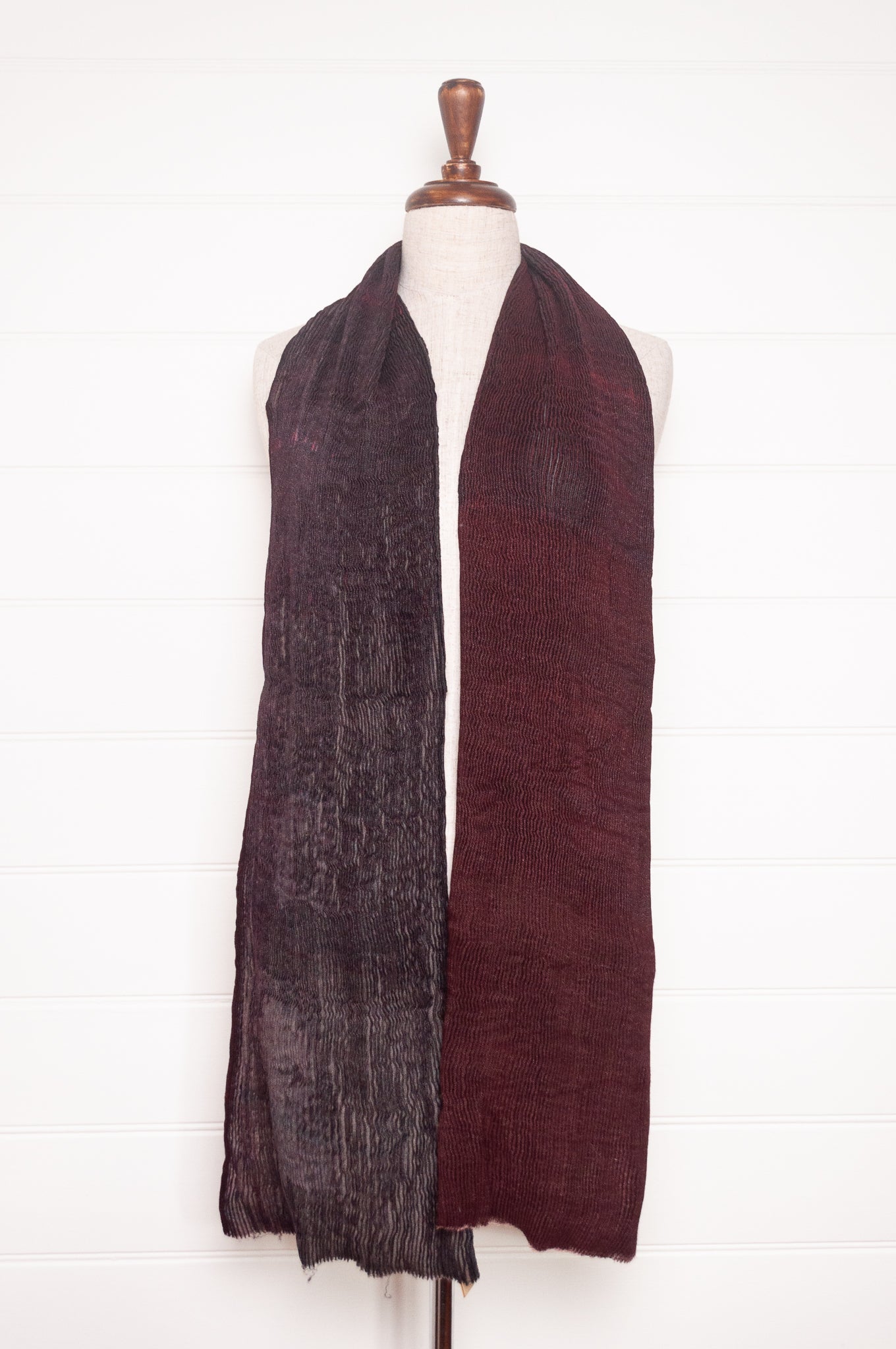 NK Shibori dyed wool scarf in wine red and charocal, pleat finish.