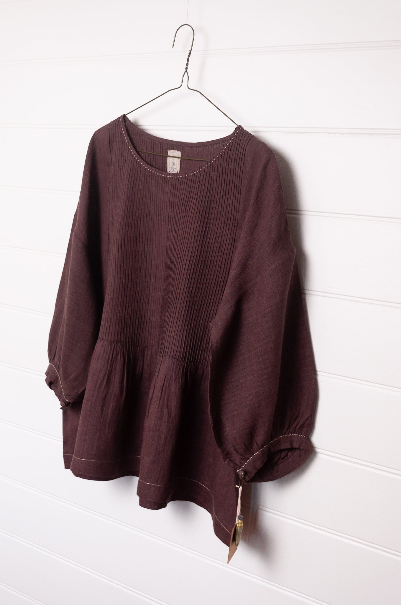 DVE Anisha pintucked top in chocolate brown linen hand stitched details.