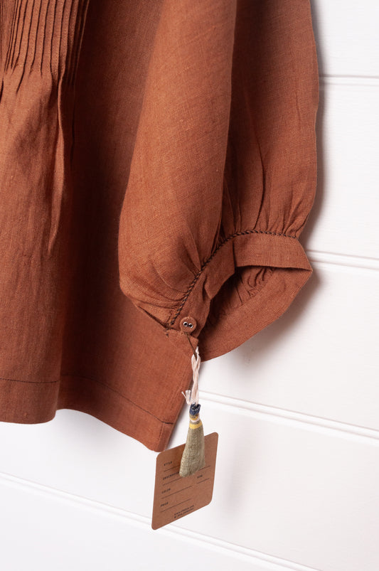 DVE Anisha pintucked top in French beige brown linen hand stitched details.